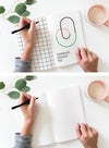 Sketchbook with Writing Hand (Mockup)