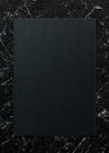 Black Paper On A Marble Background
