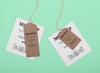 Eco Tags On Green Background Flat Lay Psd