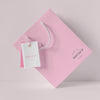 Front View Of Paper Shopping Bag Mock-Up With Paper Tag Psd