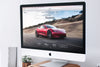 Clean iMac Mockup in Office With Bose Speakers