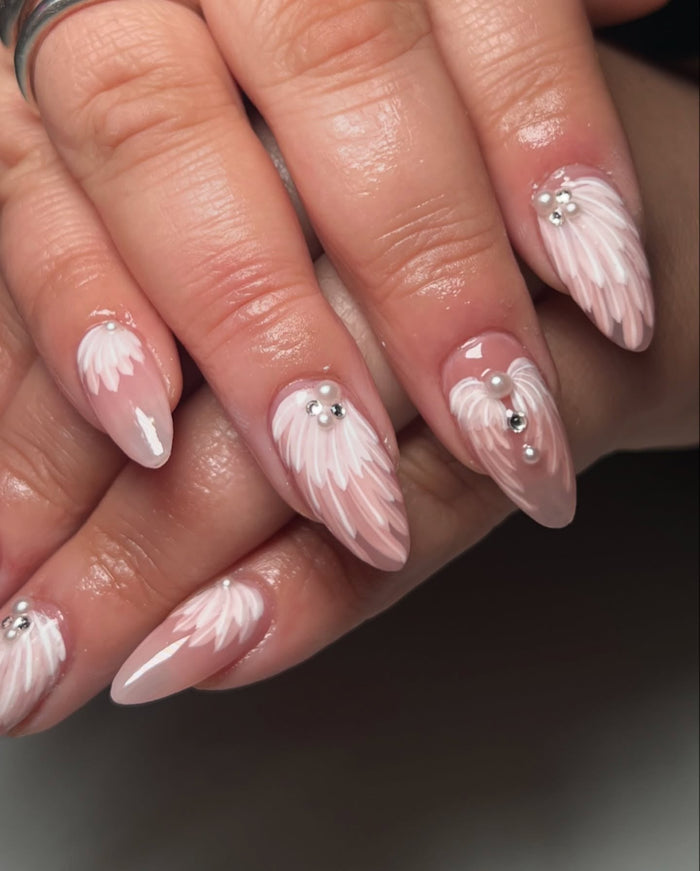 15 Chic Feather Nail Ideas
