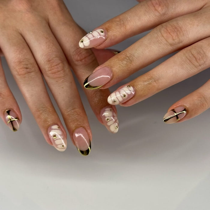 Elegant White And Gold Nail Ideas For Classy Vibes
