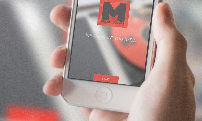 iPhone 4s in Hand (Mockup)