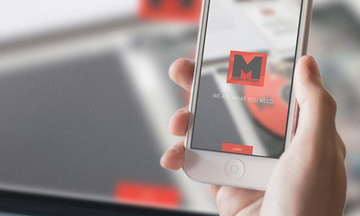 iPhone 4s in Hand (Mockup)