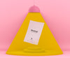 3D Pink And Yellow Environment With A Lamp Lighting Up A Folded Mockup Paper Sheet Psd
