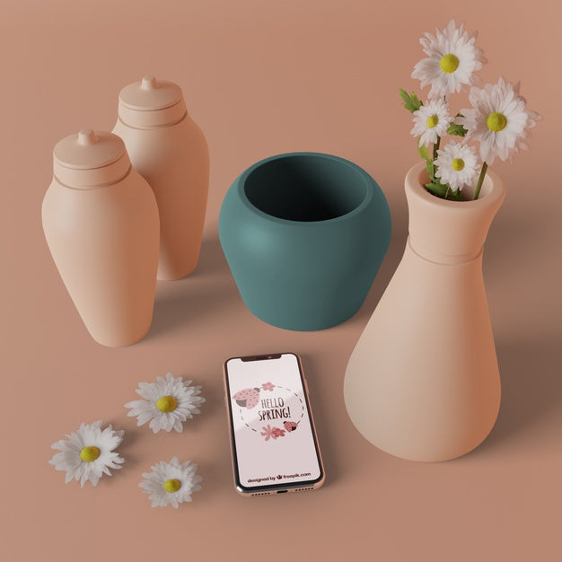 3D Vases With Flowers Beside Phone Psd