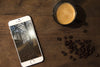 iPhone 6 Coffee Mug Table Scene PSD Mockup