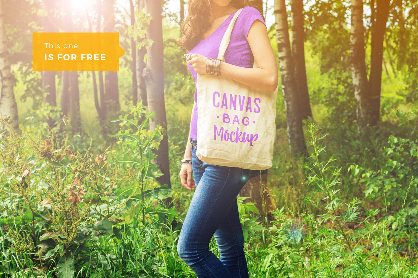Woman Holding a Canvas Bag PSD Mockup