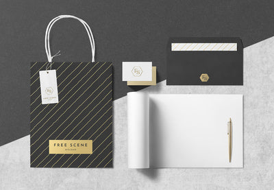 PSD Stationery Scene Mockup with Paper Bag and Pen