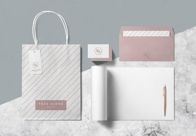 PSD Stationery Scene Mockup with Paper Bag and Pen