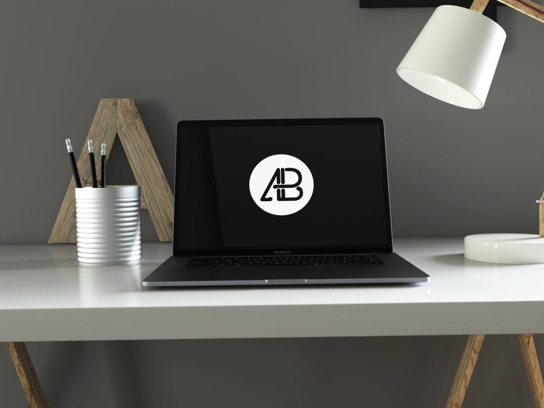 Realistic Space Gray Macbook Pro in Home Office Mockup