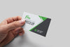 Hand Holding Realistic Business Card PSD Mockup