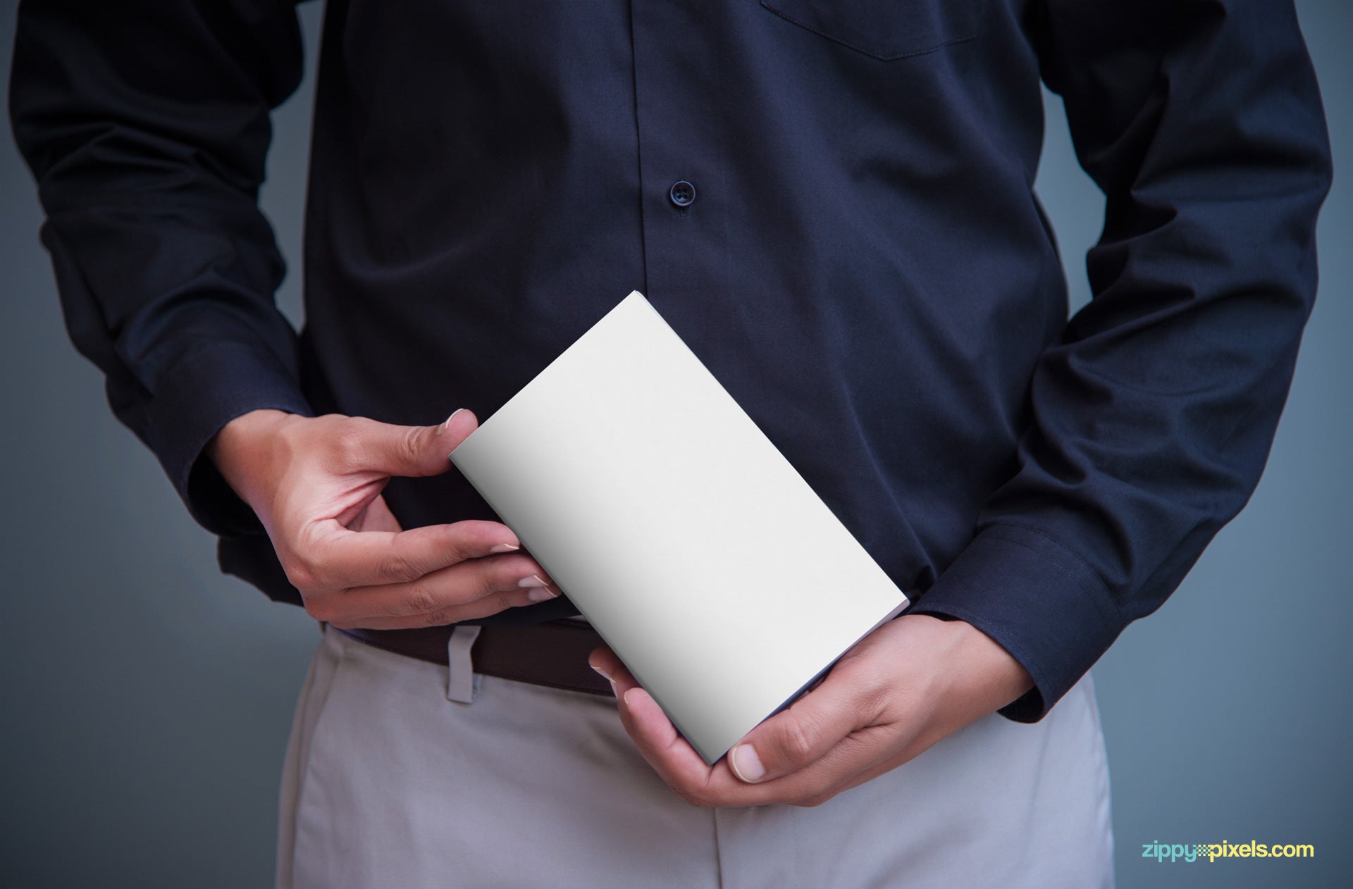 Book Cover Mock Up PSD in Mans Hand