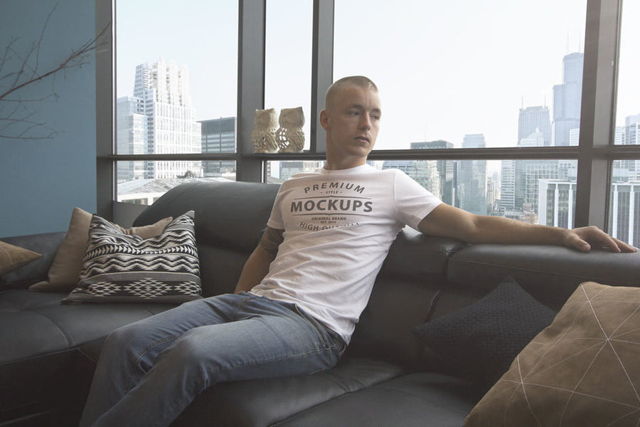 Man Wearing T-shirt With Changeable Background PSD Mockup