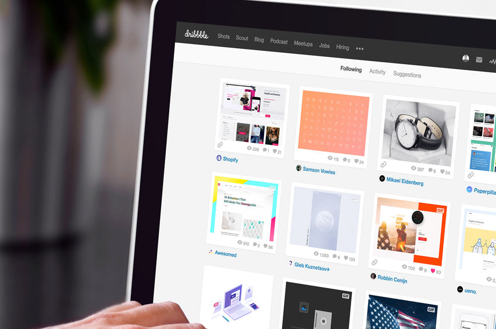 Woman Typing on a Macbook Pro Laptop PSD Mockup