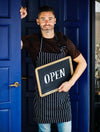 A Cheerful Small Business Owner With Open Sign