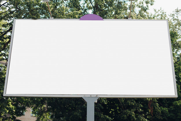 A Large Billboard With An Advertisement Picture On It In The Park On The Street Psd