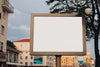 A Large Billboard With Interesting Information And Advertising On It Installed Along A Wide Street In The City Center Psd
