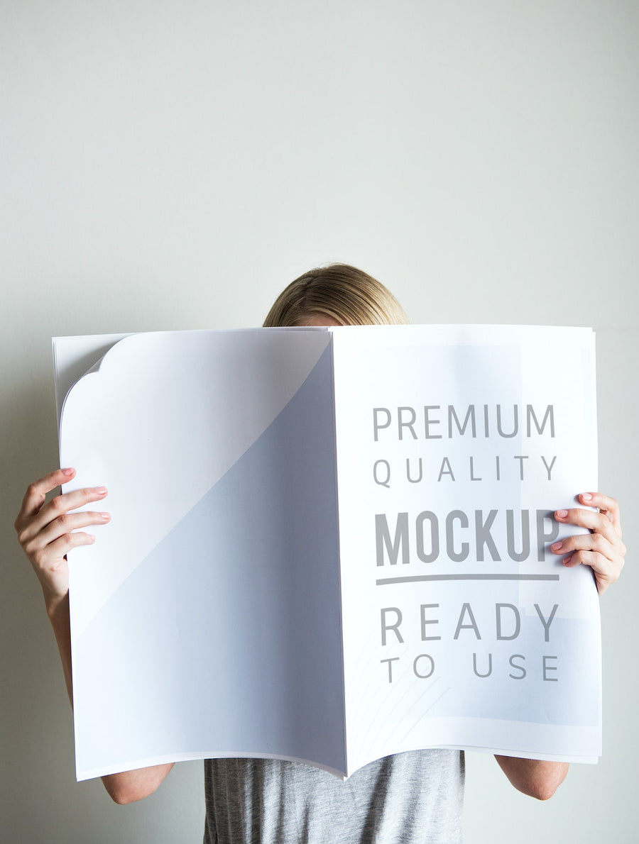 A Woman Reading Newspaper