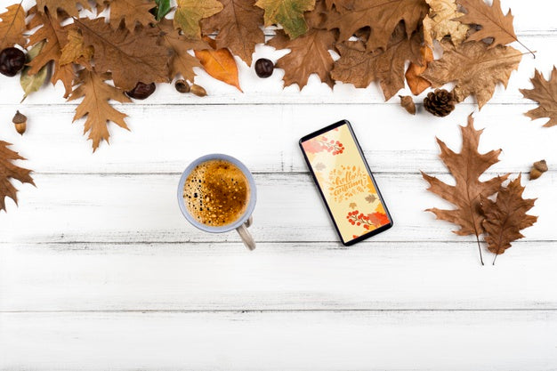 Above View Coffee Cup With Smartphone Psd