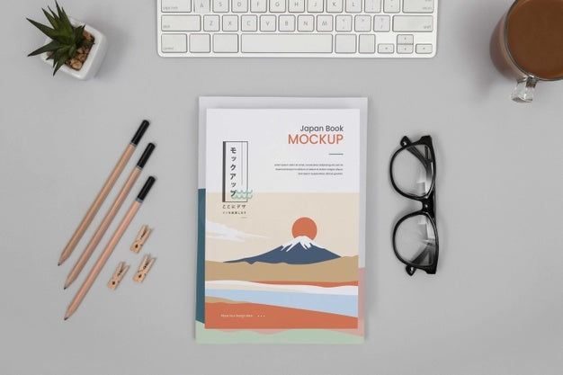 Above View Desk Arrangement With Book Psd