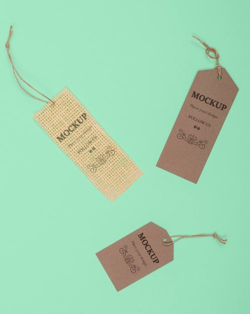 Above View Eco Tags On Green Background Psd