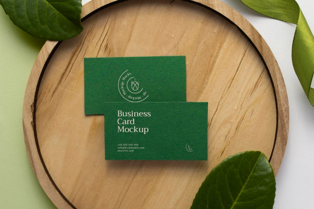 Above View Stationery With Wood And Plant Psd