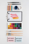 Acrylic Palette And Brushes Beside Clipboard Psd