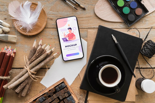 Acrylic Palette And Brushes Beside Cup Of Coffee Psd