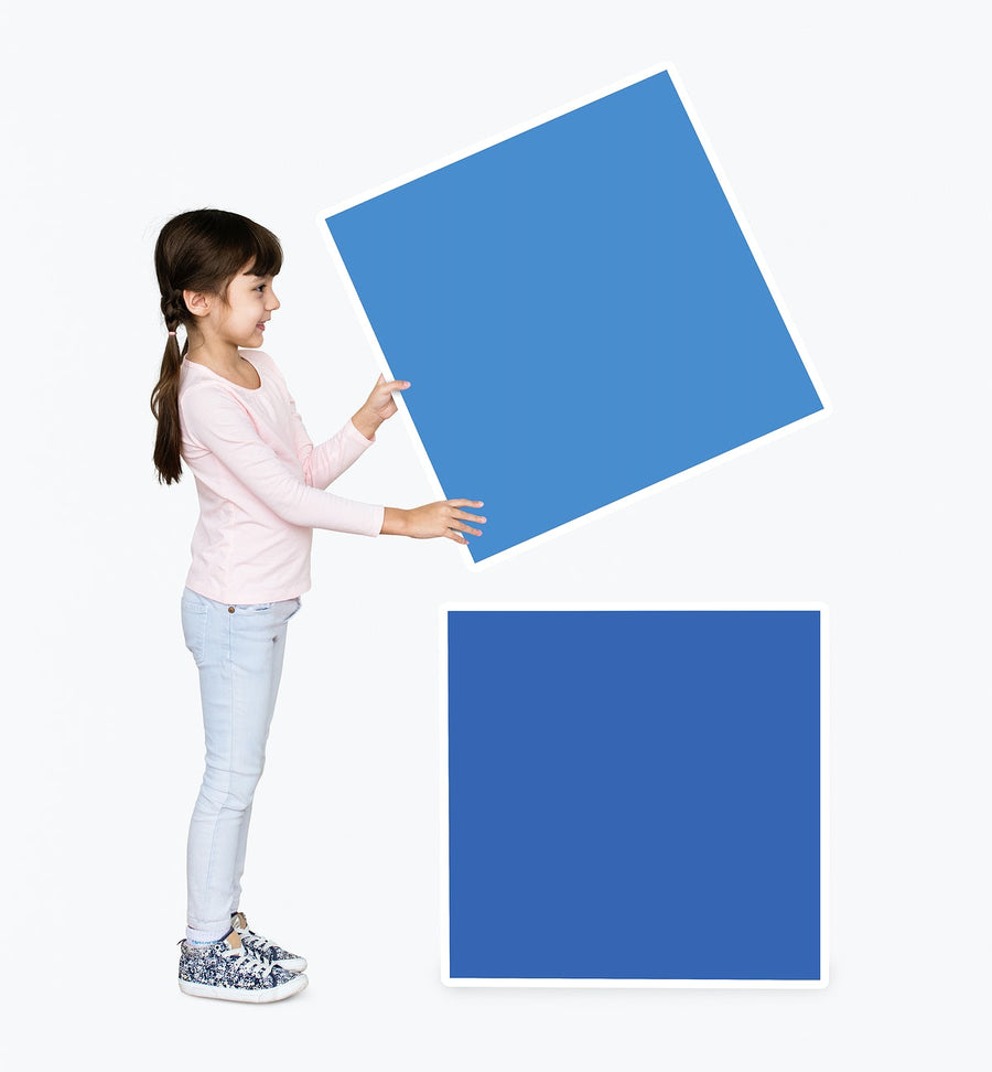 Adorable Girl Stacking Empty Square Boards