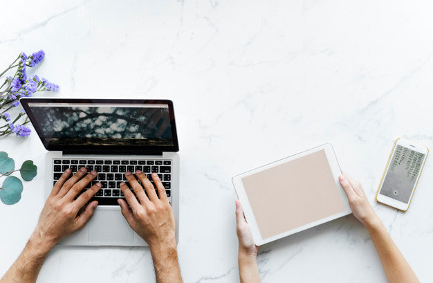 Aerial View Of A Couple Using Digital Devices Psd