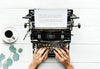 Aerial View Of A Man Typing On A Retro Typewriter Psd