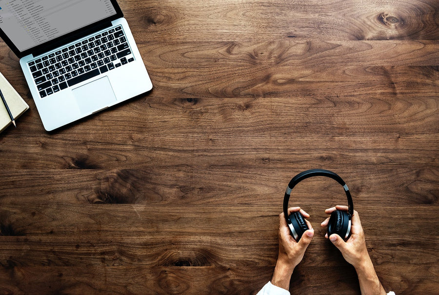 Aerial View Of Computer Laptop On Wooden Table