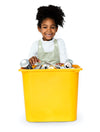 African Descent Girl Holding Plastic Container