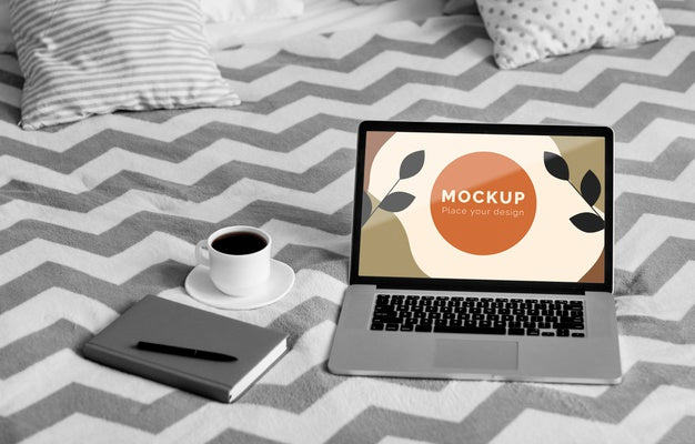 Agenda And Mobile Beside Laptop Psd