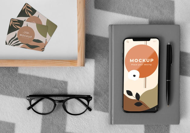 Agenda And Mobile On Bed Psd