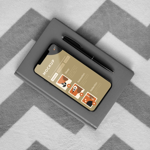 Agenda And Mobile On Bed Psd