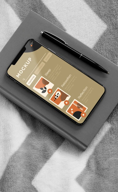 Agenda And Mobile On Bed Psd