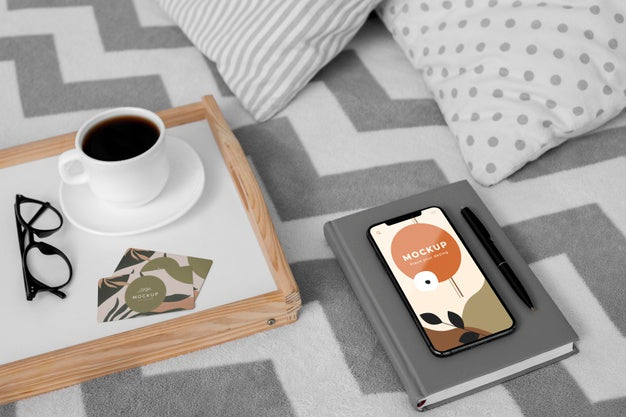 Agenda And Mobile On Bed Psd