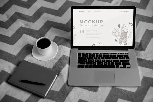 Agenda And Pen Beside Laptop Psd