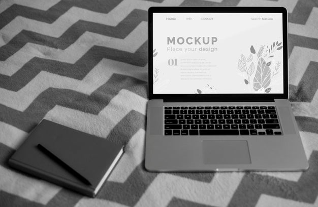 Agenda Beside Laptop Psd