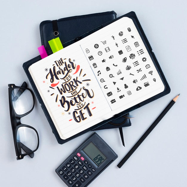 Agenda On Desk With Motivational Quote Psd