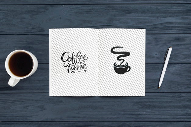 Agenda On Desk With Pen And Coffee Beside Psd