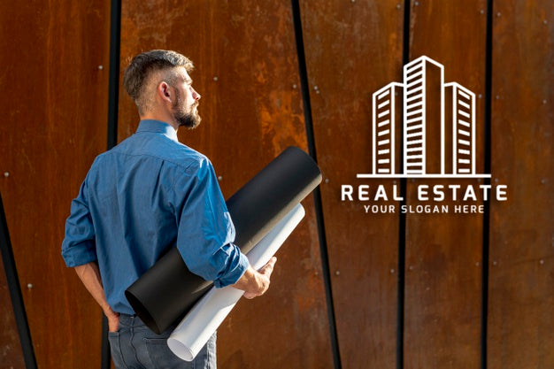 Agent Man Holding Plans For New Building From Behind Psd