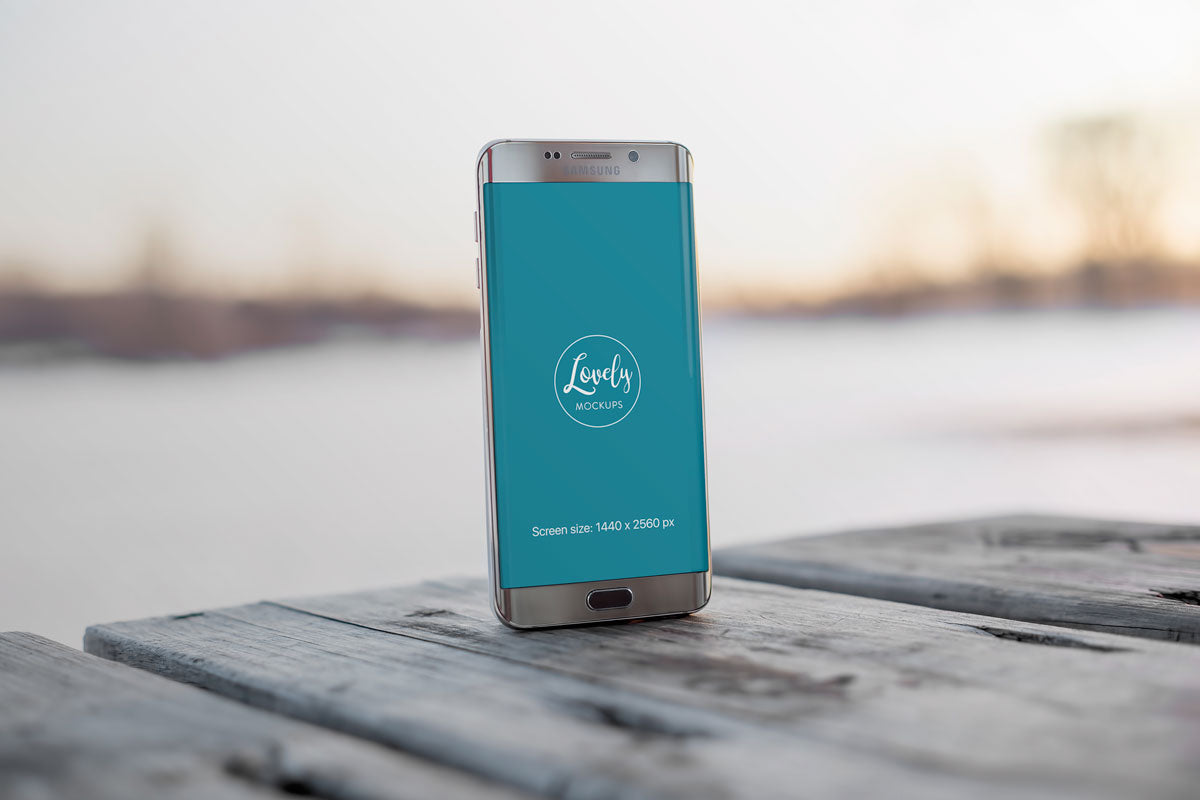 Android Smart Phone Mockup on a Wooden Table Outdoors