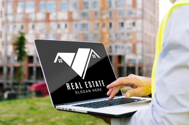 Architect Holding A Laptop Mock-Up Psd