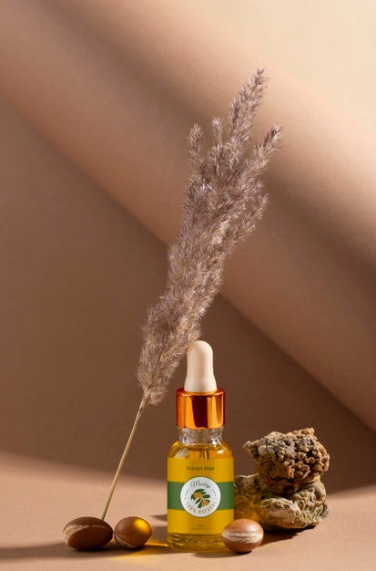 Argan Oil Cosmetic Bottle Mock-Up With Rock Psd