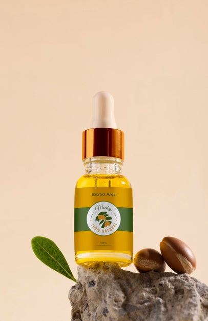 Argan Oil Cosmetic Bottle Mock-Up With Rock Psd