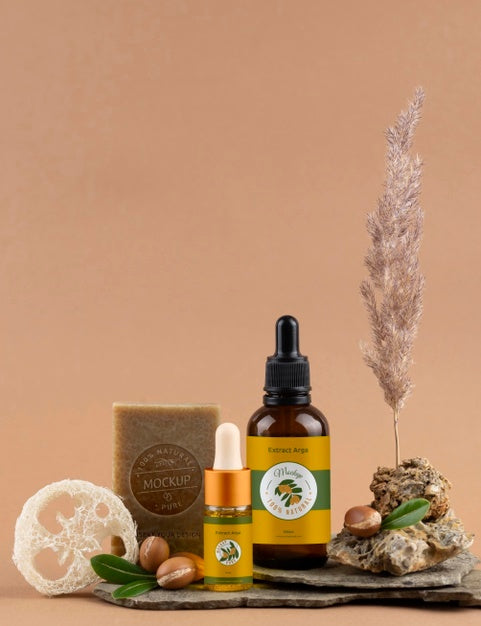 Argan Oil Cosmetic Bottle Mock-Up With Soap Bar And Kernels Psd